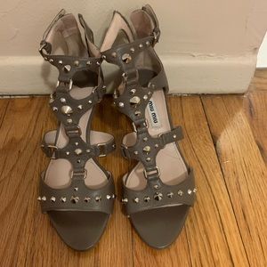 Miu miu studded sandals.